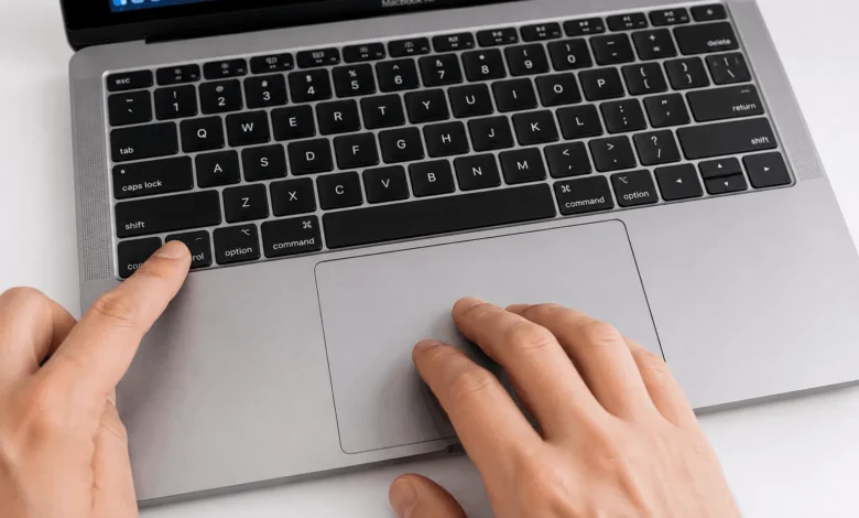 How to Right Click on a Laptop (Windows, Mac, Chromebook) 1 Hand pressing Control key on MacBook keyboard while clicking the trackpad to right-click