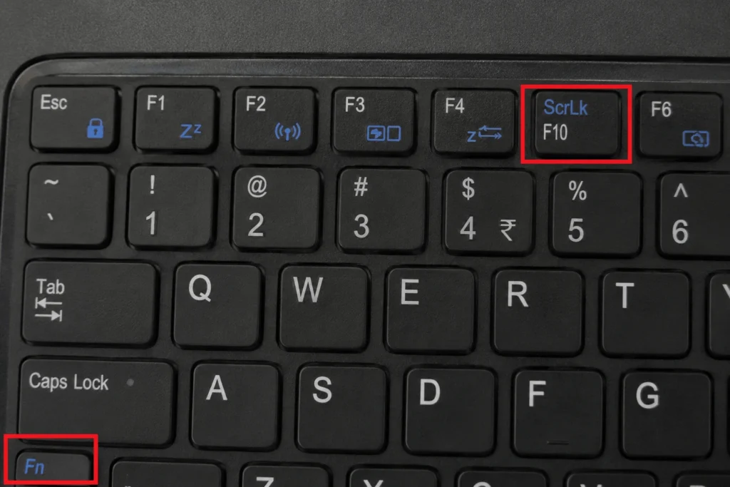 Scroll Lock On Laptop: What It Does And How To Fix It 2 Close-up of a laptop keyboard showing the blue ScrLk (Scroll Lock) label on a shared key with the Fn key highlighted.