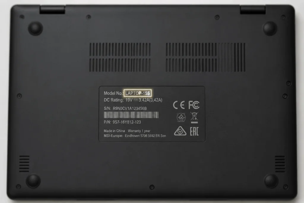 Laptop Keyboard Guide: Types, Fixes and Buying Tips 4 Technician replacing a laptop keyboard by disconnecting the ribbon cable and fitting a new keyboard