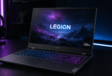 Lenovo Legion 5 gaming laptop with RGB backlit keyboard on a dark desk