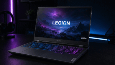Lenovo Legion 5 gaming laptop with RGB backlit keyboard on a dark desk