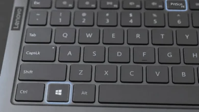 Close-up of Lenovo laptop keyboard highlighting the Windows key and PrtScn key used to screenshot